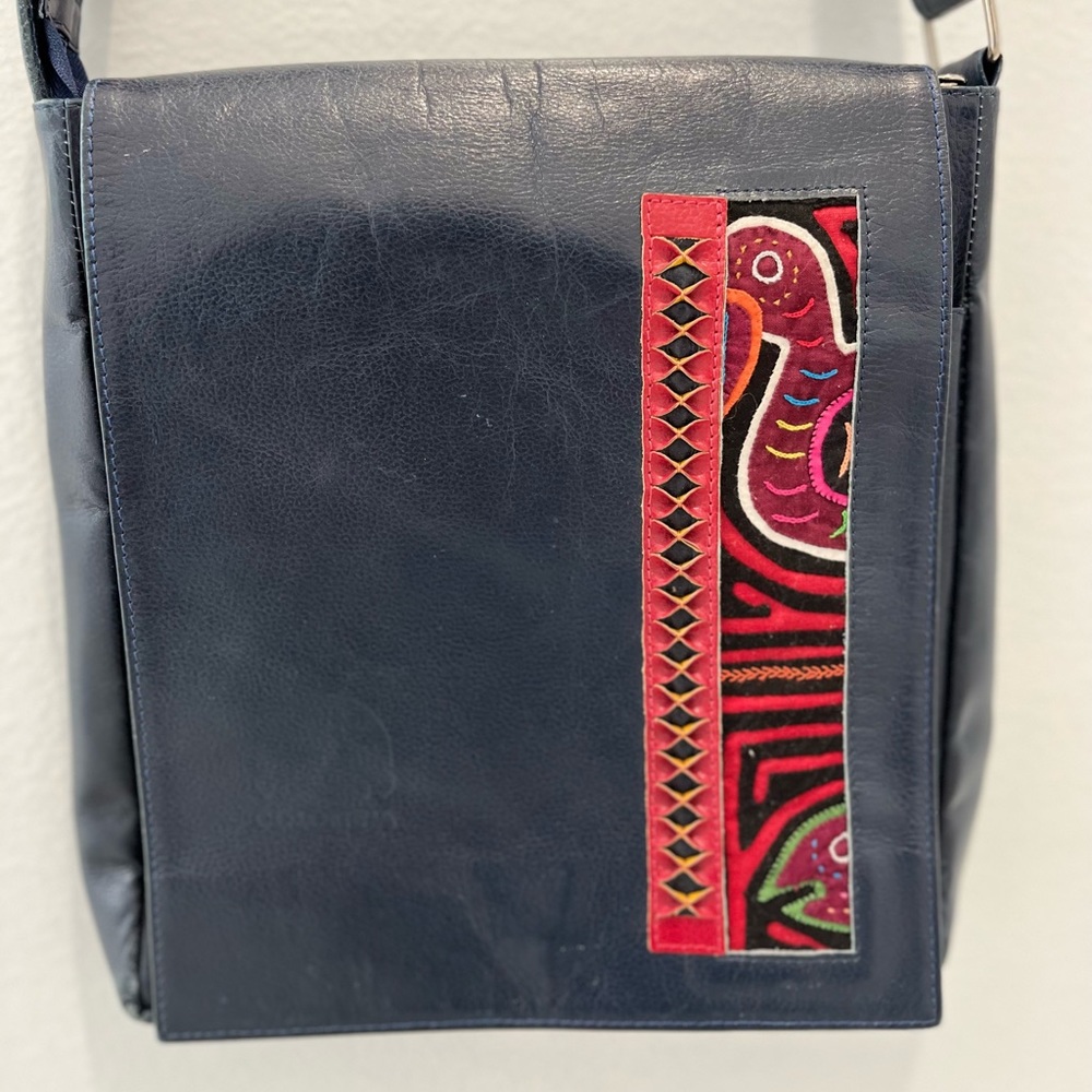 Handmade, artisanal crossbody bag.
